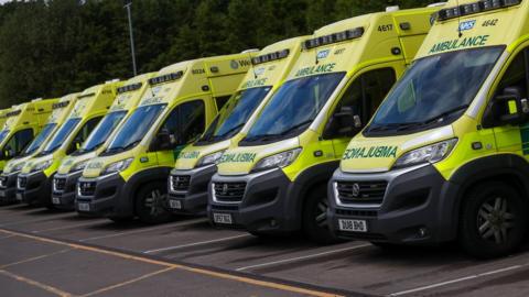 Ambulances are parked at the Hollymoor Ambulance Hub of the West Midlands Ambulance Service