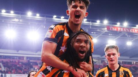 Kasey Palmer celebrates with teammates after equalising against Stoke.