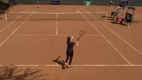 Hajar Abdelkader fails to serve properly during her match with Lorena Schaedel