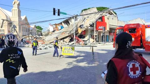 A collapsed commercial building is seen following a magnitude 8.2 earthquake in Mindanao, Philippines, on June 8, 2026.