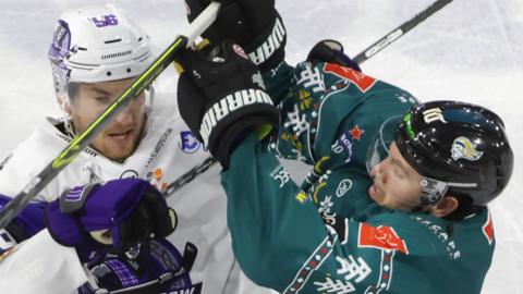 Glasgow Clan's Andrew Mclean tussles with Scott Conway