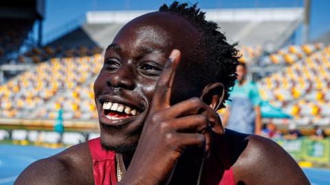 Gout Gout smiles after competing