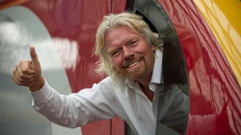 Richard Branson on a Virgin Train in the UK