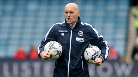 Adam Barrett overseeing a training session at Millwall