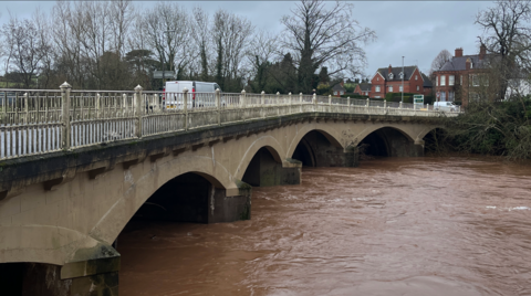 A bridge in Tenbury Wells with high water levels running underneath