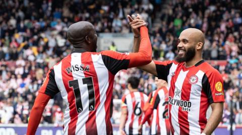 Yoane Wissa and Bryan Mbeumo celebrate scoring
