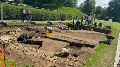 An archaeological dig taking part to uncover remains of a Norman Castle in Chichester's Priory Park
