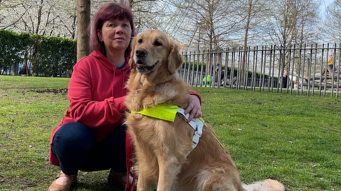Sarah Leadbetter with her guide dog Nellie in London