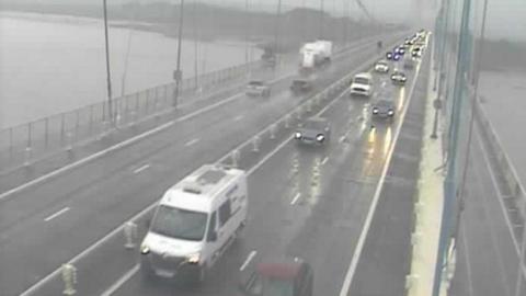 Cars driving over the M4 Prince of Wales bridge westbound