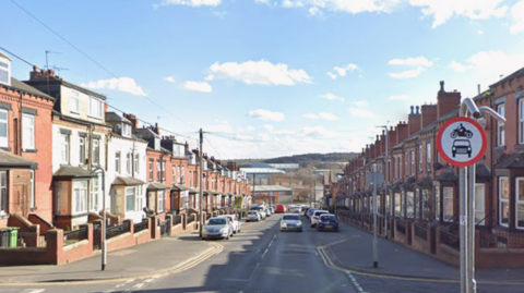 A quiet terraced street on a sunny day