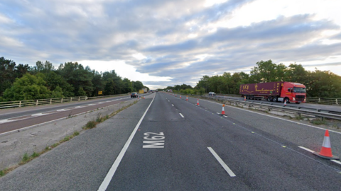 A Google Street View capture of the M62 near Goole, where the M18 joins the M62 at junction 35. It is a three-lane tarmac motorway with cars and lorries travelling on it.