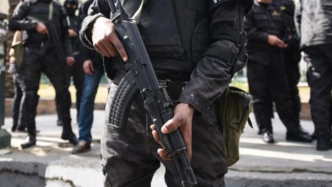 File photo showing Egyptian police special forces stand guard in Cairo's Tahrir Square on 25 January 2016