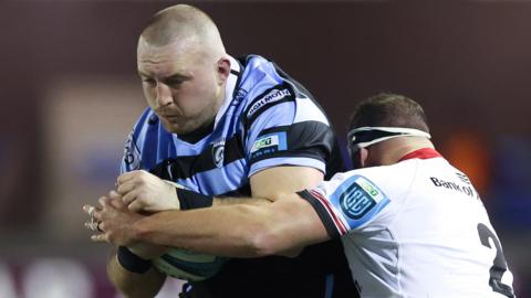 Dillon Lewis of Cardiff takes on Rob Herring of Ulster