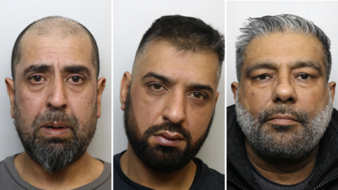 Headshots of men in their 40s and 50s. All three have beards. The one on the left has a closely shaved head, the middle man has dark hair and the one on the right has grey hair. 