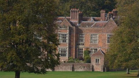 The Chequers estate, seen from through trees in the grounds