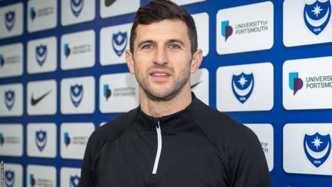 Portsmouth appoint Oxford United player-coach John Mousinho as their new head coach.