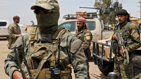 File photo showing Syrian Democratic Forces (SDF) fighters in eastern Deir al-Zour province on 1 May 2018