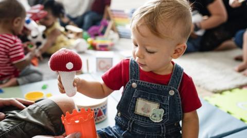 Stock image of a young child playing