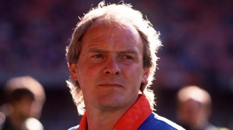 Terry Yorath looks on during a Wales game