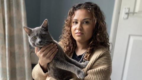 Amber French and one of her cats