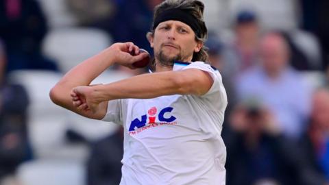 Jack White bowling for Yorkshire