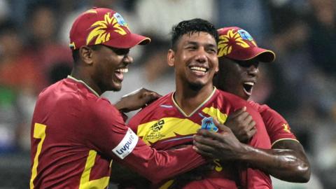 West Indies spinner Gudakesh Motie (centre) celebrates taking a wicket