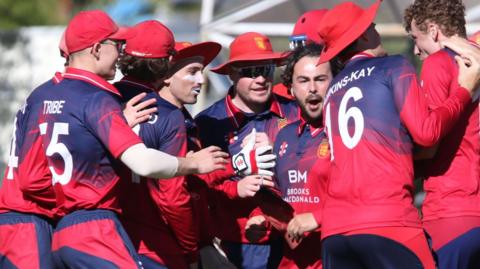 Jersey celebrate a wicket