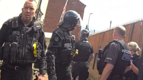 Police raiding a property in Mansfield