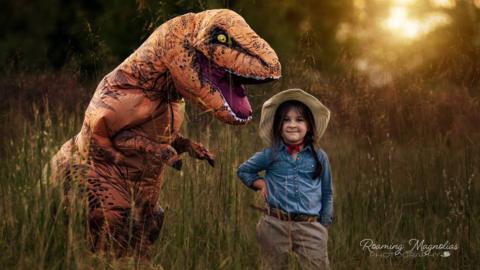 Levi and his 'best friend' cousin Lola pose for a family photo shoot in Georgia, US