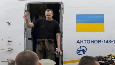 Ukrainian film director Oleg Sentsov leaves a plane at Boryspil international airport as part of a prisoner swap with Russia, 7 September 2019