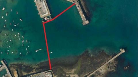 St Peter Port Harbour in Guernsey with a red line showing where people can dive on Christmas Day