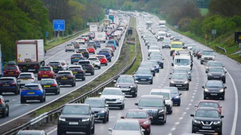 Hundreds of cars queuing in both directions on a British motorway