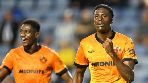Wolves defender Saheed Olagunju celebrates his goal against Sheffield Wednesday in the EFL Cup