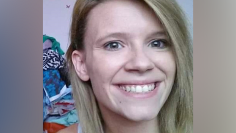 Close-up selfie of Rebecca Simkin smiling and looking into camera