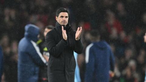 Mikel Arteta applauds the fans after a match