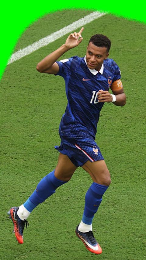 Kylian Mbappe smiles to the crowd as he celebrates France's first goal in the 2026 World Cup third place final.
