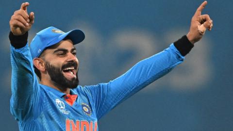 Virat Kohli celebrates a wicket