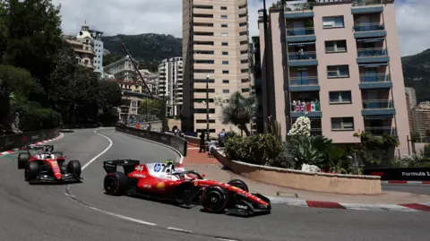 Ferrari's Charles Leclerc ahead of team-mate Lewis Hamilton going into the hairpin in Monaco Grand Prix final practice