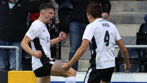 Glentoran's David Fisher and Frankie Hvid