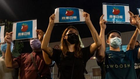 Supporters outside Apple Daily headquarters