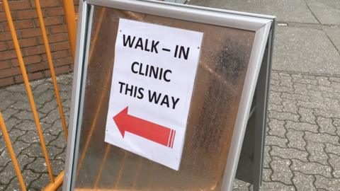 Covid walk-in clinic sign