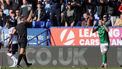 Louie Barry is red carded during Stockport's draw with Bolton on Monday
