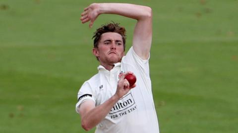 George Balderson of Lancashire bowling 