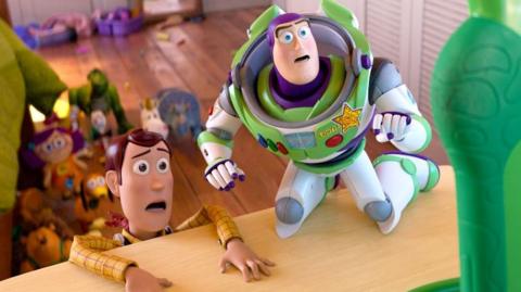 Woody and Buzz Lightyear looking scared of the digital tablet known as Lilypad