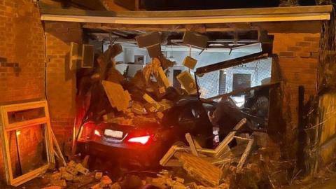 A car sits in rubble after crashing in Spennymoor