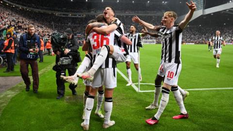 Newcastle players celebrate scoring