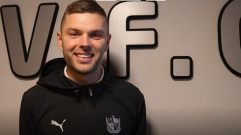 Matt Hancock in a Port Vale hoodie