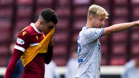 Lennon Miller and David Watson during a Premier Sports Cup last 16 match between Motherwell and Kilmarnock at Fir Park, on August 18, 2024