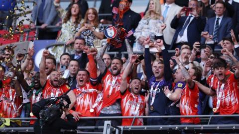 Luton Town players celebrate promotion