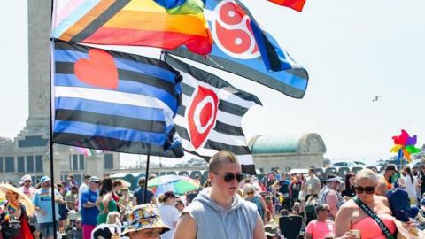 The 2023 pride event with flags on Southsea Common